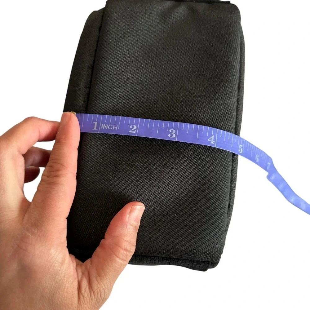 Black Camera Bag with Adjustable Strap and Durable Fabric